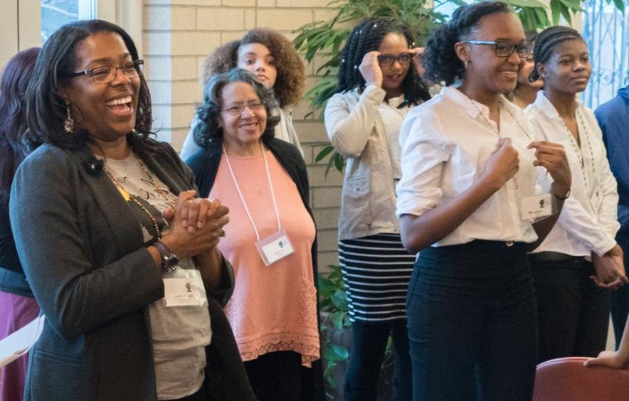 black women leading a seminar